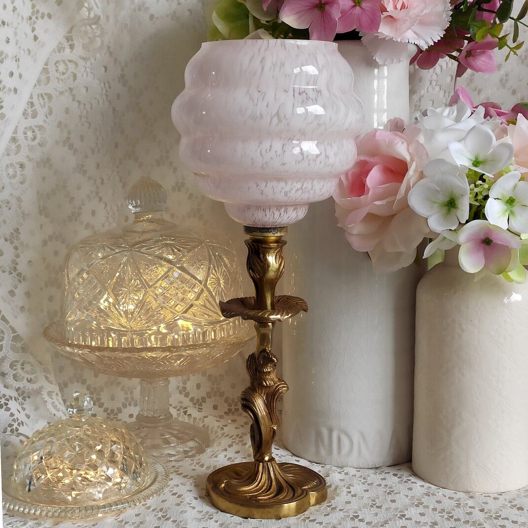 Pink clichy globe lamp and golden metal foot