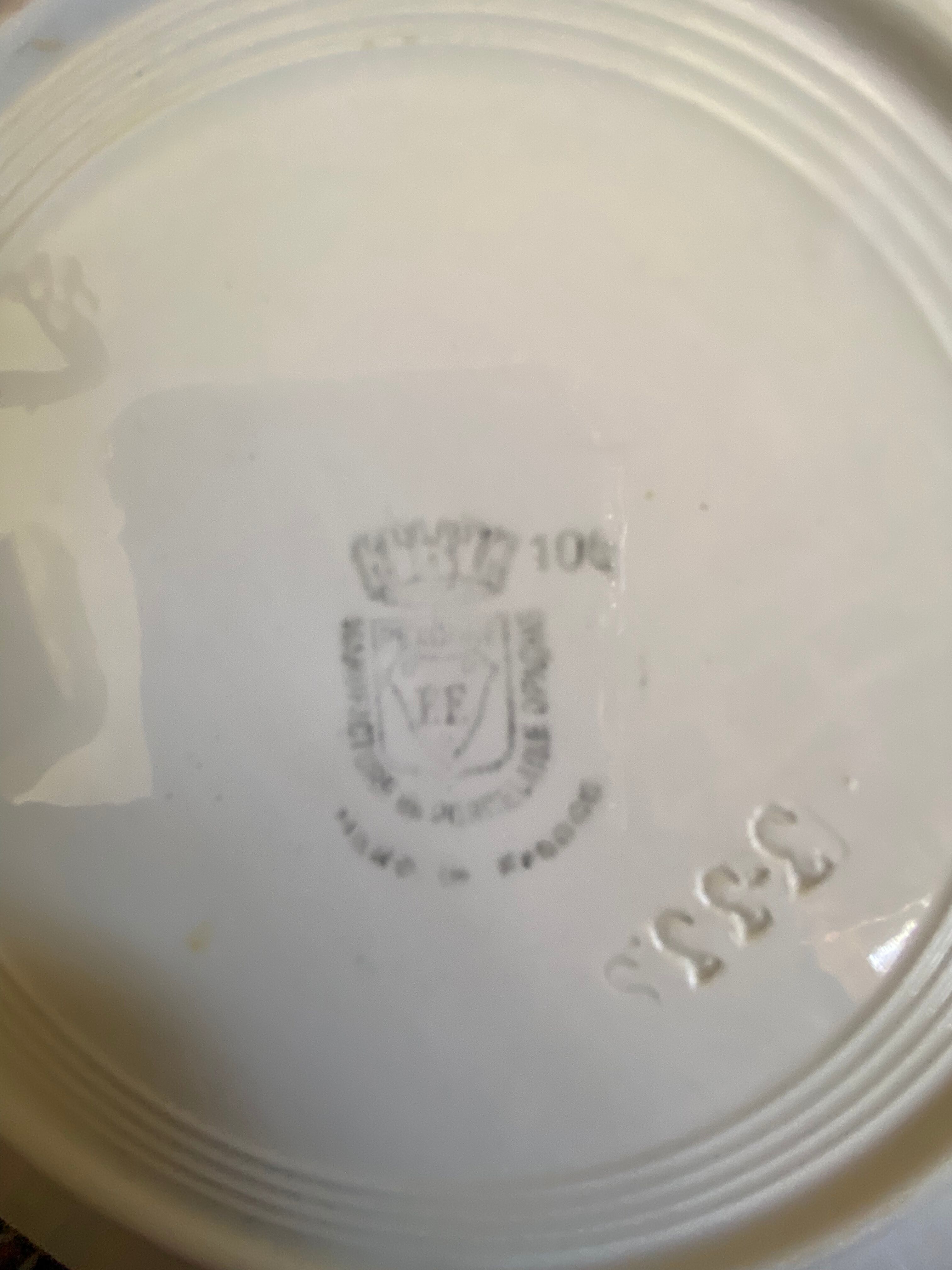 7 matching dessert plates in red green and blue.