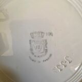 7 matching dessert plates in red green and blue.