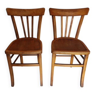 pair of vintage wooden bistro chairs