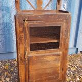 Glass-fronted entrance cabinet in Burmese teak