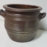 Old varnished sandstone pot