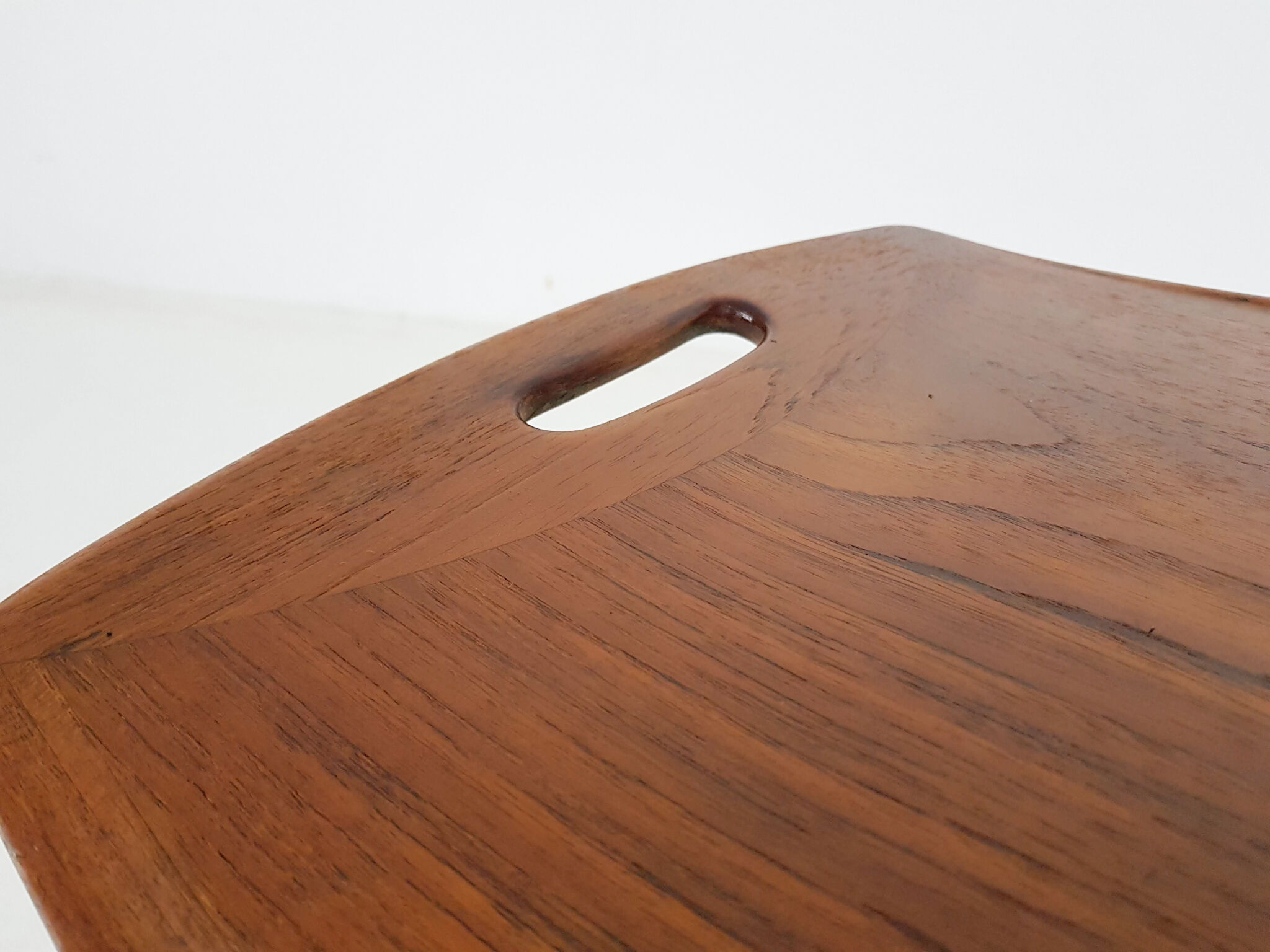 Teak side table with handles by Jens Quistgaard