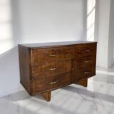 A vintage Italian chest of drawers, made of veneered walnut and solid wood,