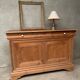Honey-colored wood sideboard