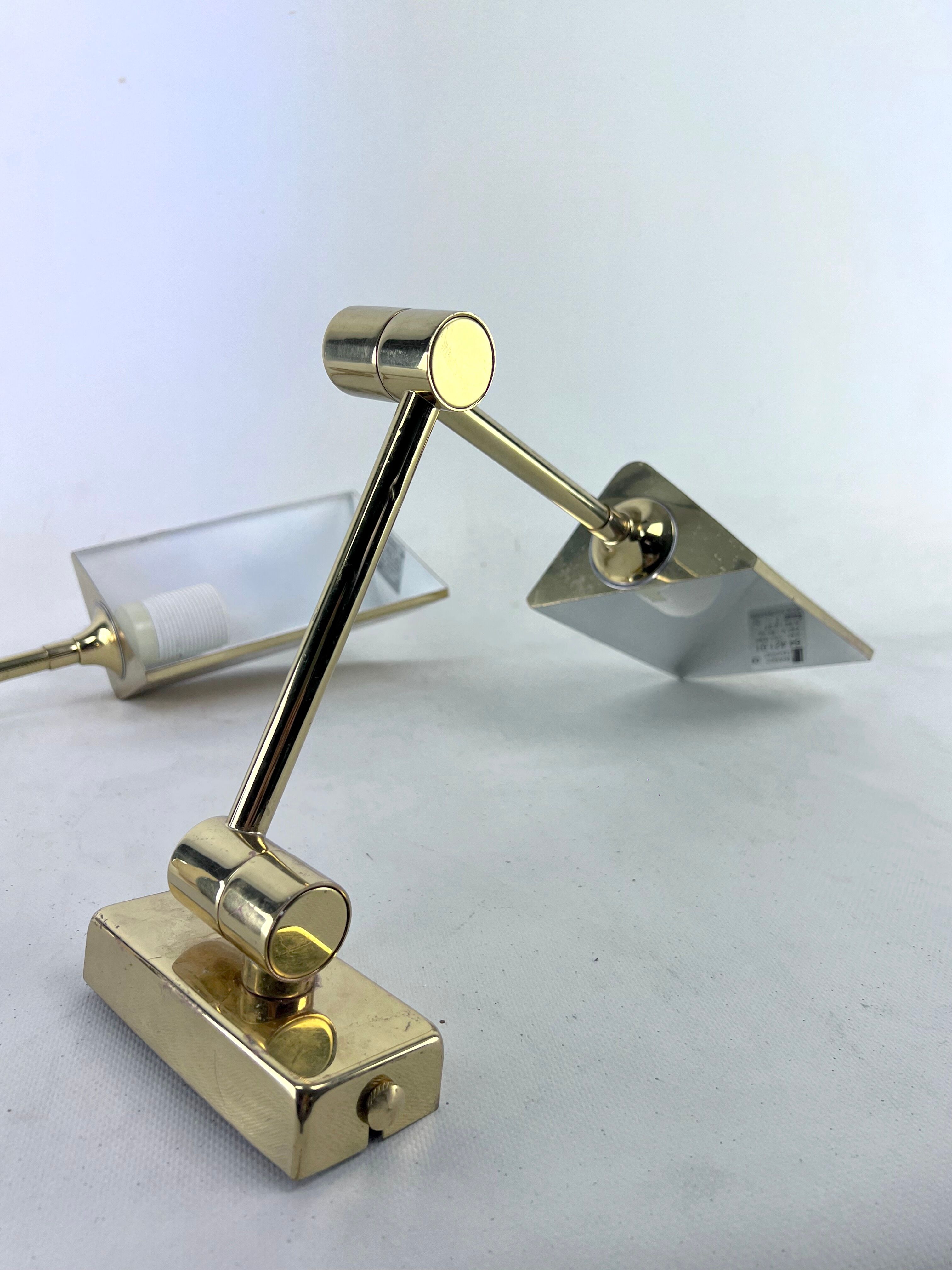 Postmodern pair of articulated brass wall lamps by Baulmann Leuchten. Germany 1980s