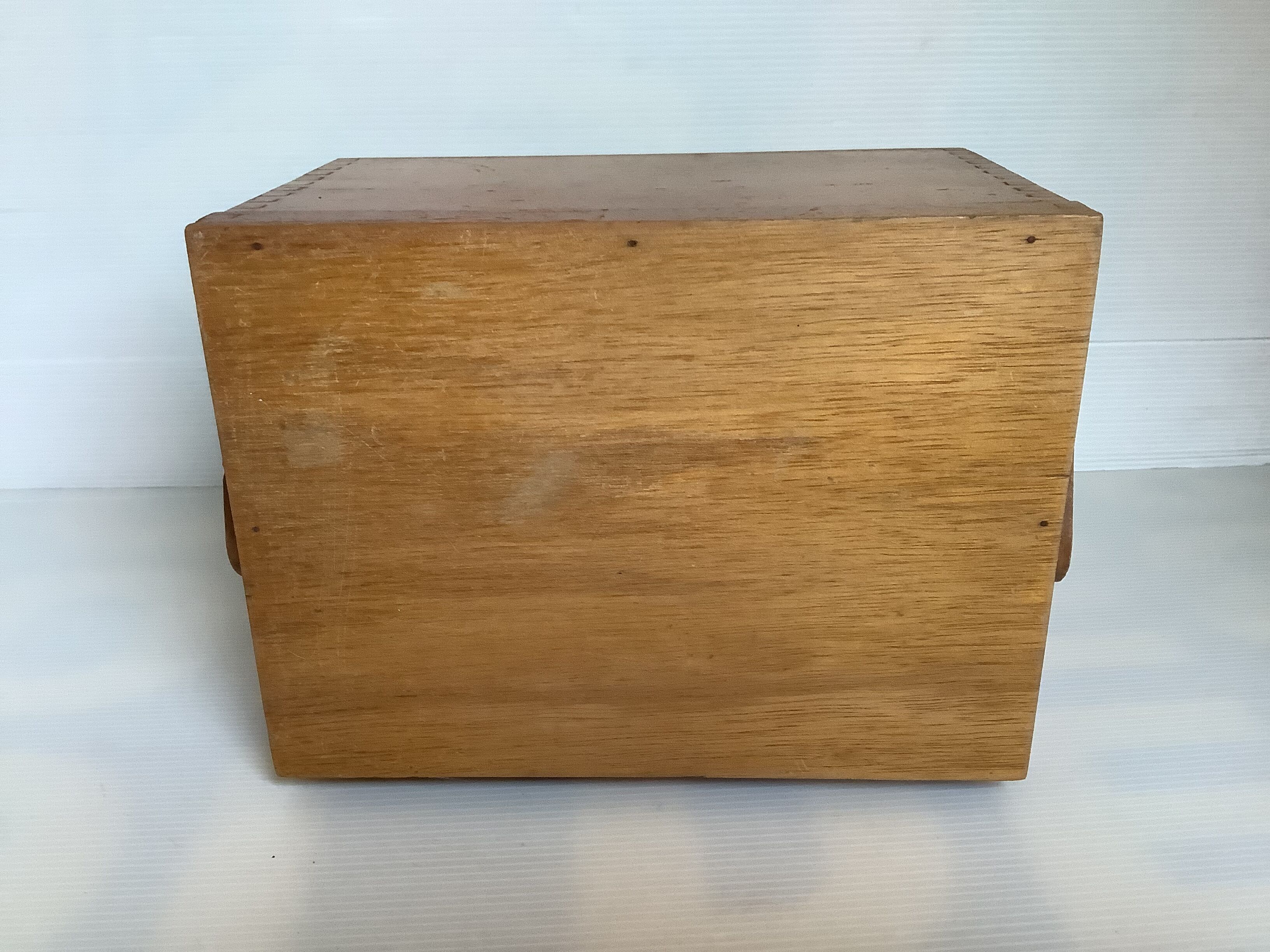 Wooden storage box dovetail mounting