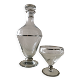Carafe and its crystal glass.