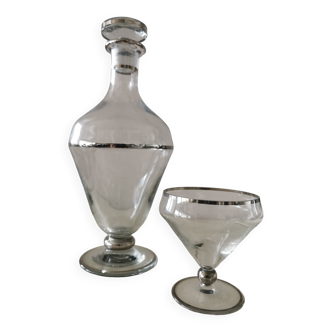 Carafe and its crystal glass.