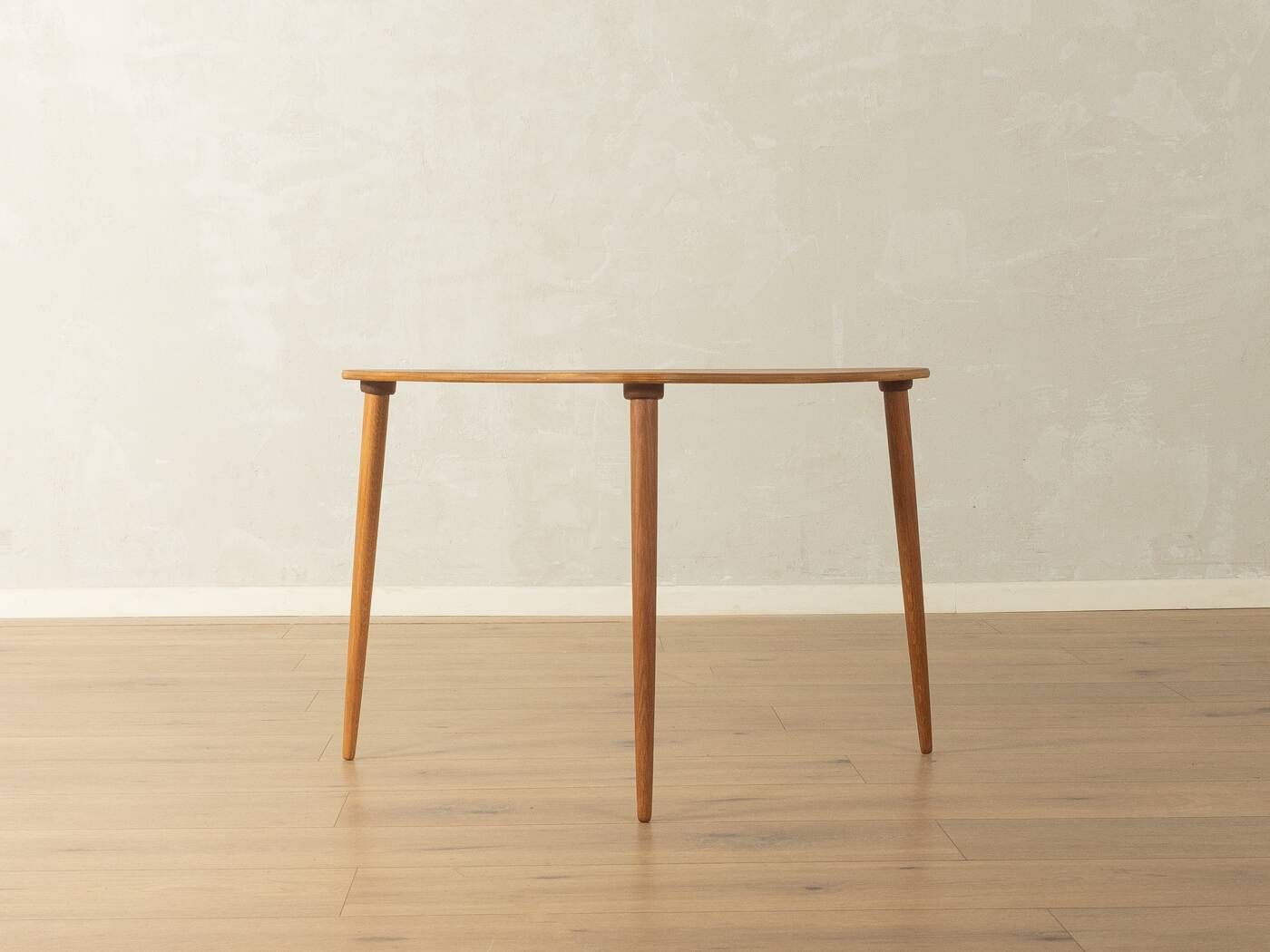 Elegant side table from the 1960s with triangular silhouette, teak wood