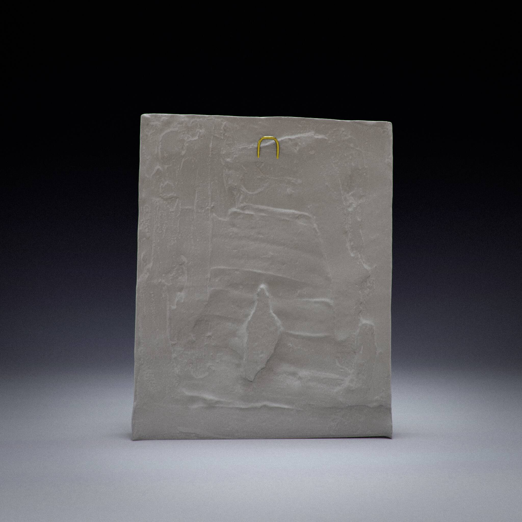 Bas-relief plaster mural with a fleur-de-lis design.