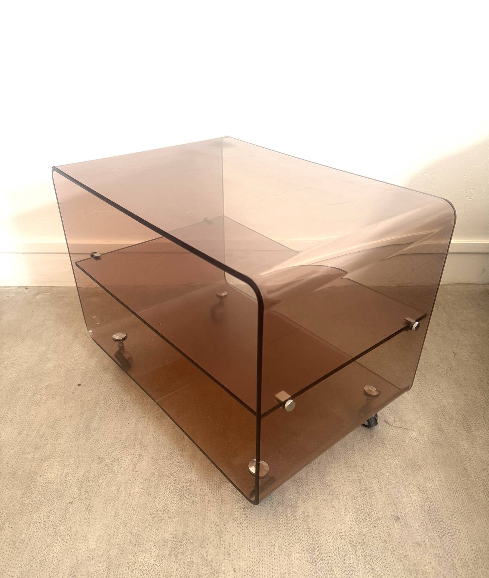 Coffee table / serving table in smoked plexiglass by Michel Dumas
