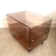 Coffee table / serving table in smoked plexiglass by Michel Dumas