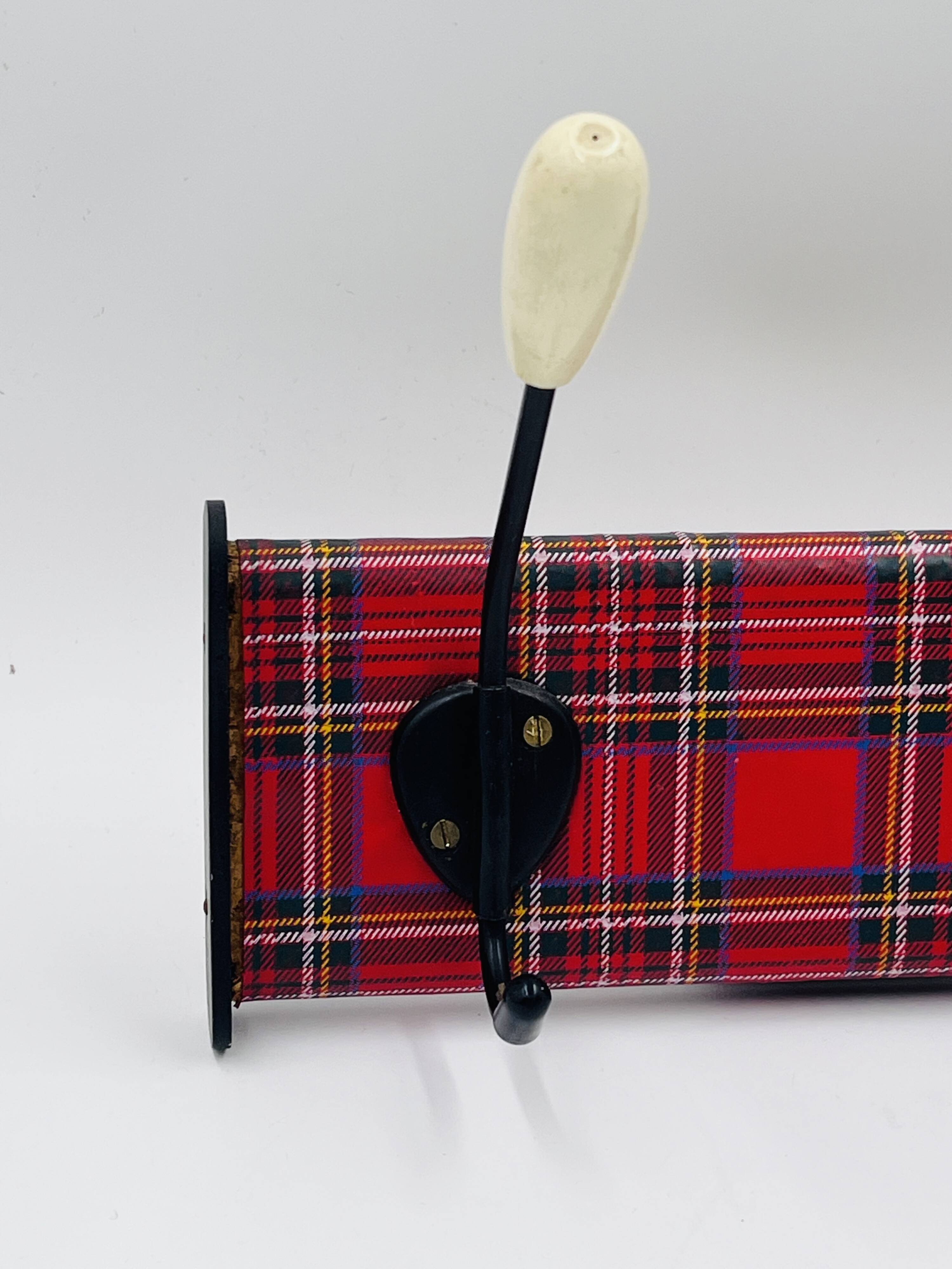 Vintage red Scottish coat rack from the 1970s.