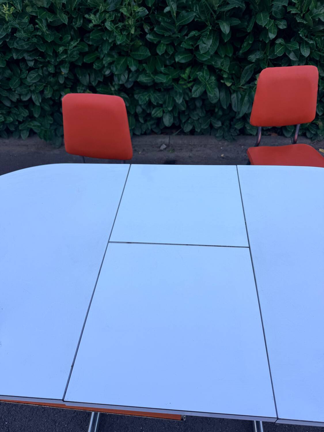 Formica leatherette chair with orange table, vintage 70s Space Age