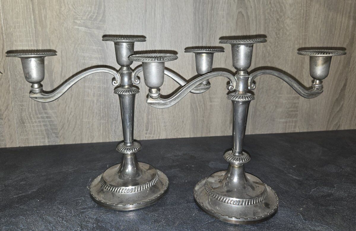 Pair of three-light candlesticks in silver-plated metal