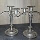 Pair of three-light candlesticks in silver-plated metal