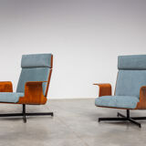 Pair of modernist teak lounge chairs and poufs 1960