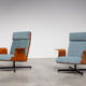 Pair of modernist teak lounge chairs and poufs 1960