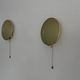 Pair of green plexiglass and gold metal wall lights by Erco, 1950s, Germany.