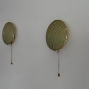 Pair of green plexiglass and gold metal wall lights by Erco, 1950s, Germany.