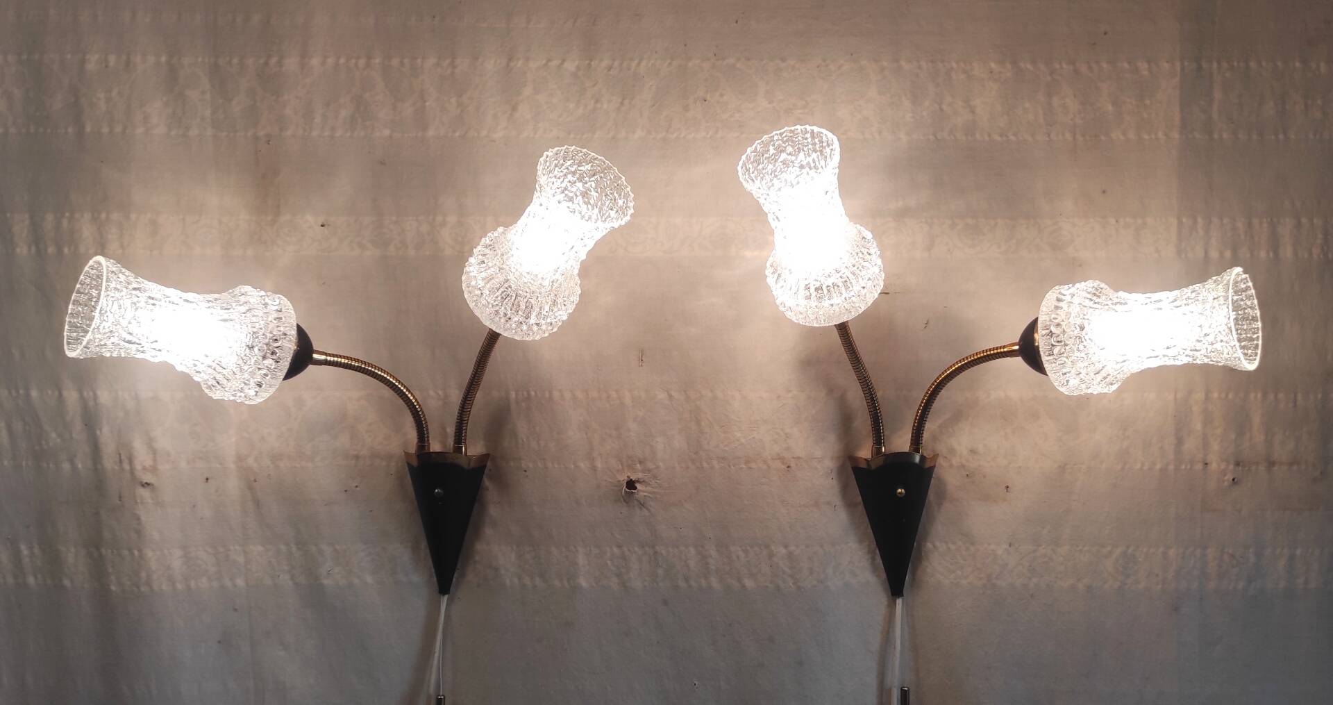 Articulated double light wall sconces in brass and glass - mid 20th century.