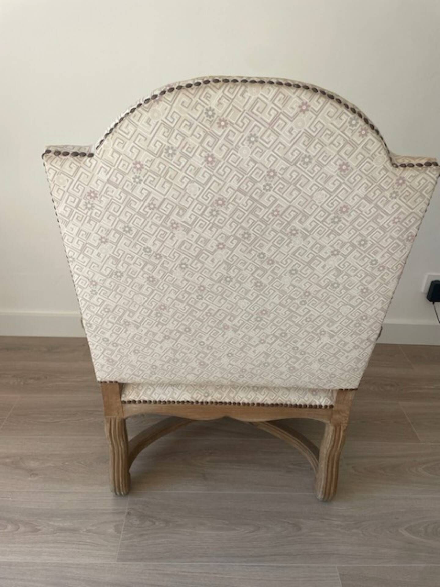 Low armchair in Louis XV style