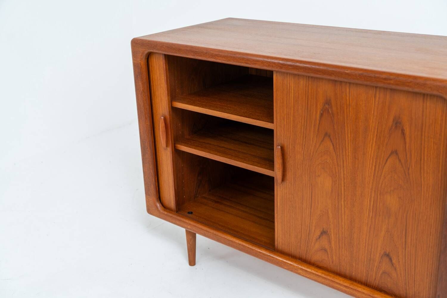 Svend Dyrlund teak sideboard with tambour doors (Denmark, 1960s).