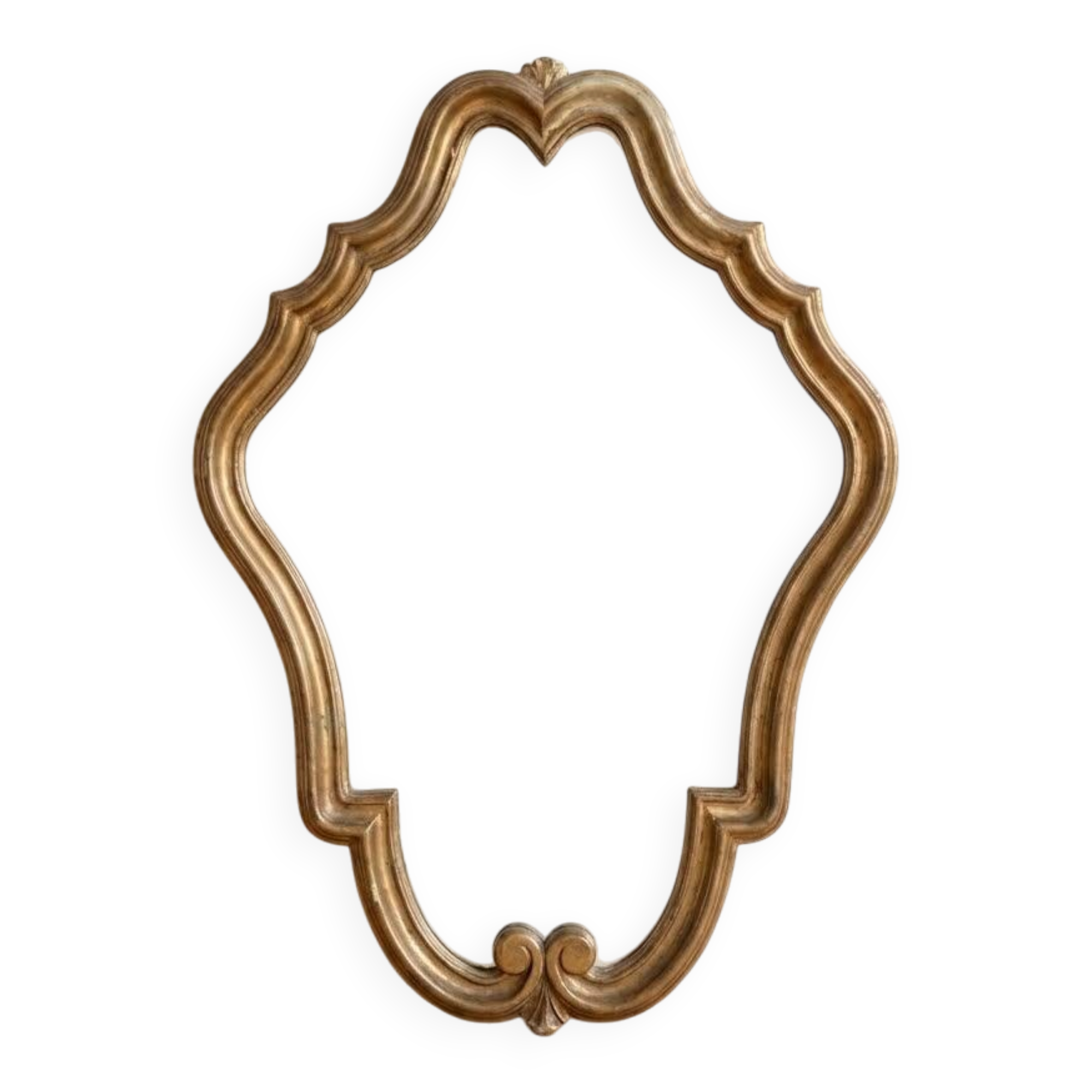 Antique mirror with a gilded wooden frame.