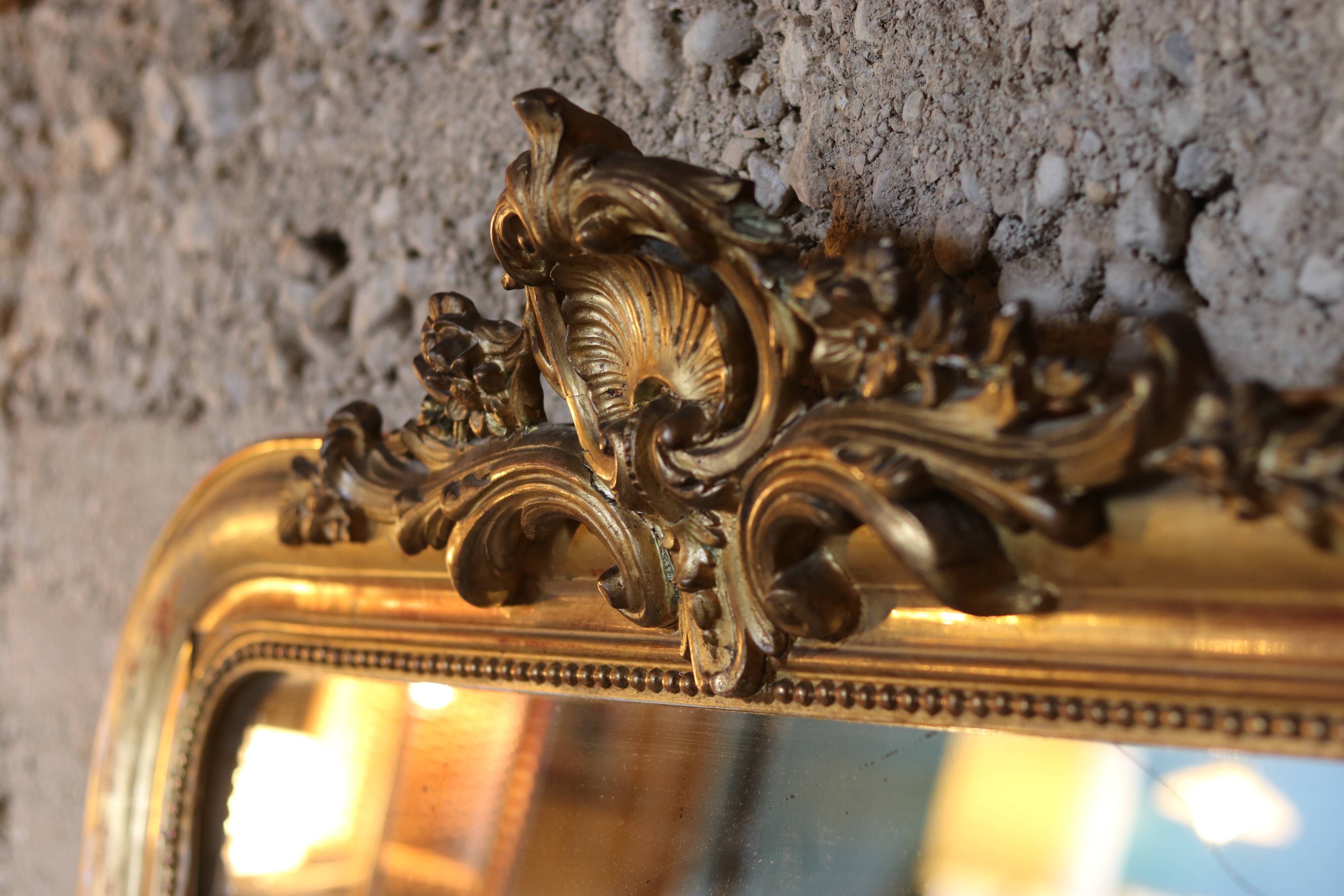 Large Louis XVI style mirror, wood and gilded stucco