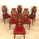 Set of 6 Italian Renaissance style chairs in solid walnut, finely carved.