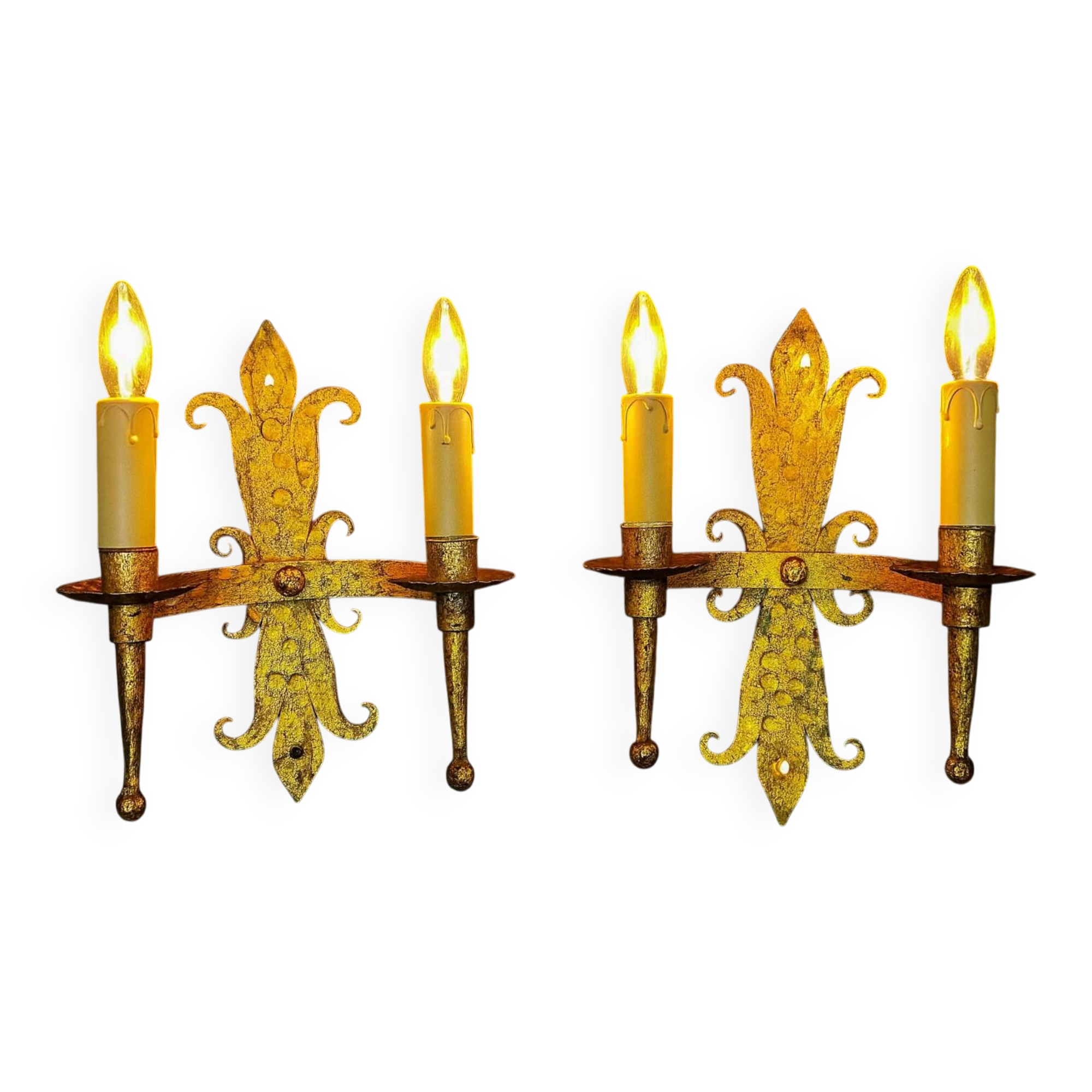 Pair of electrified golden wrought iron gothic wall sconces.