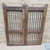 Old gate in Burmese teak and wrought iron