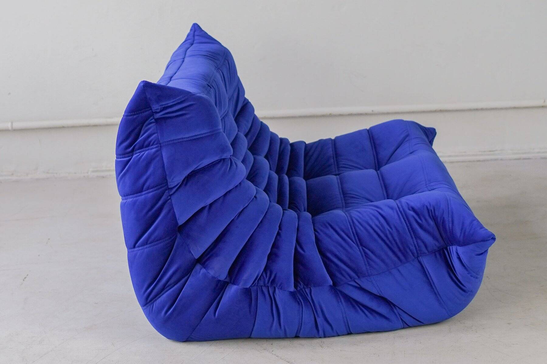 Togo two-seat in blue velvet by Michel Ducaroy for Ligne Roset
