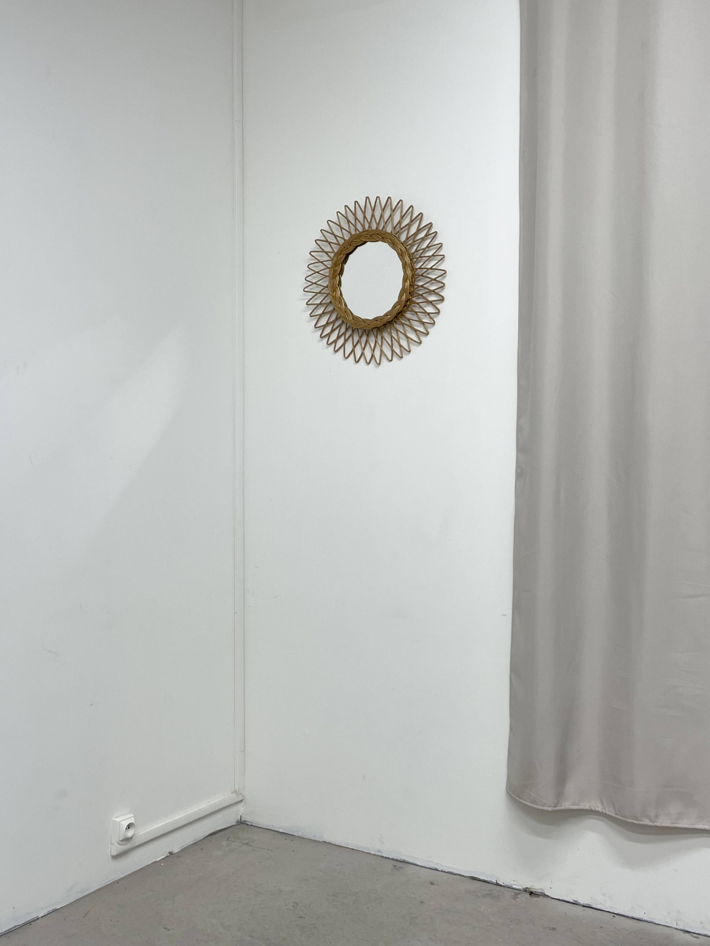 Woven wicker sun mirror