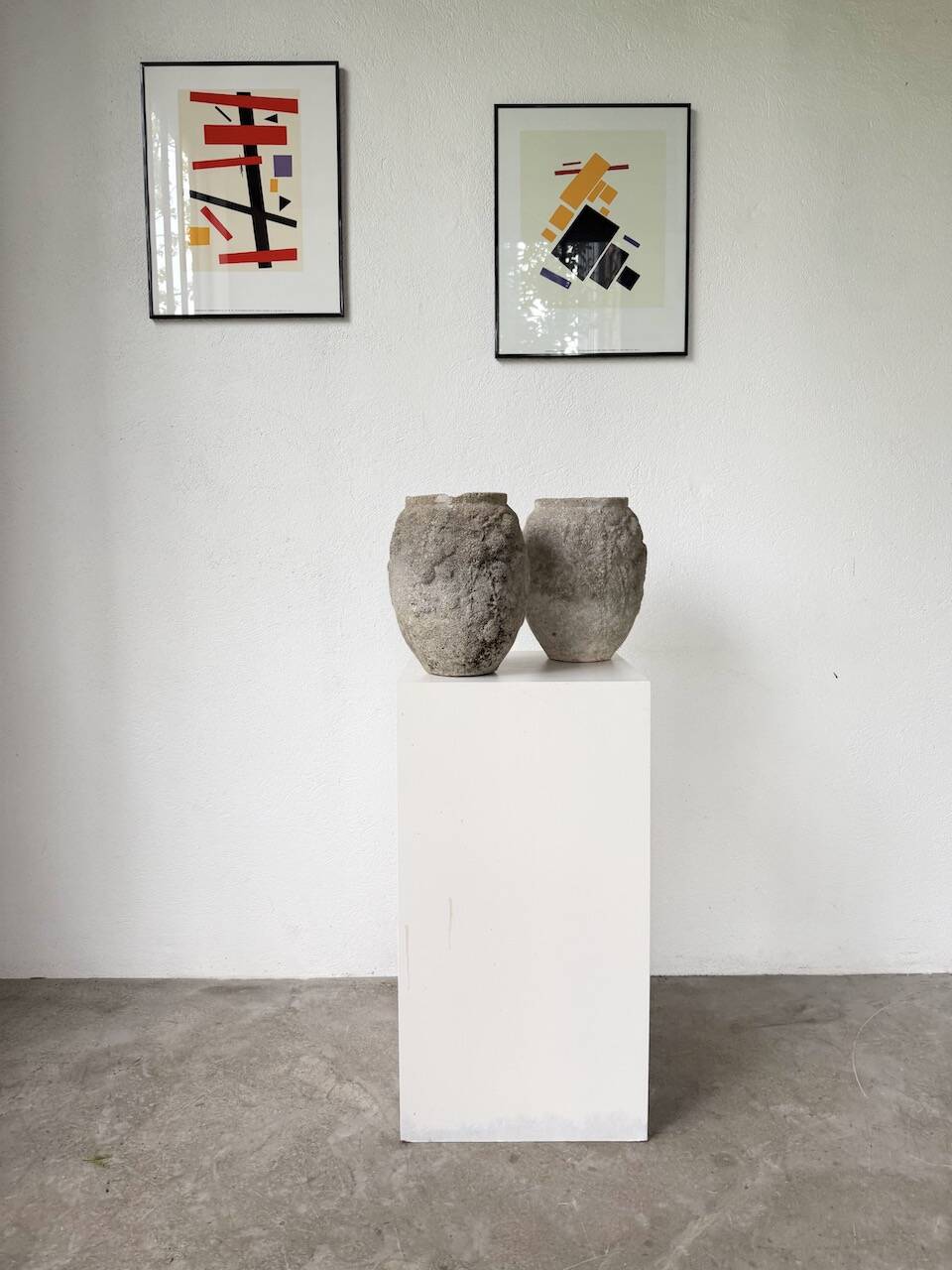 Pair of cement planters, 1900