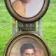 Set of 2 medallion frames in molded wood and canvas