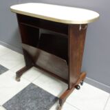 Pink formica magazine table 1950s