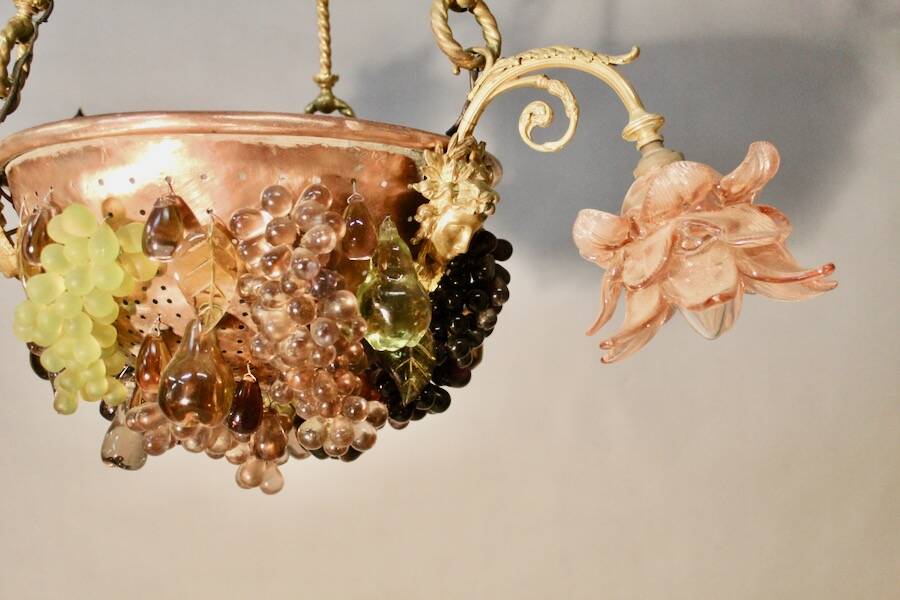 Bronze three-armed chandelier with a grape decoration.