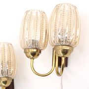 Pair of Graewe wall lights in brass and tinted glass, 1960s.