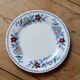 Vintage Gien earthenware flat plate with floral pattern on the border