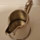 White Félix Frères metal milk pot in Toulouse