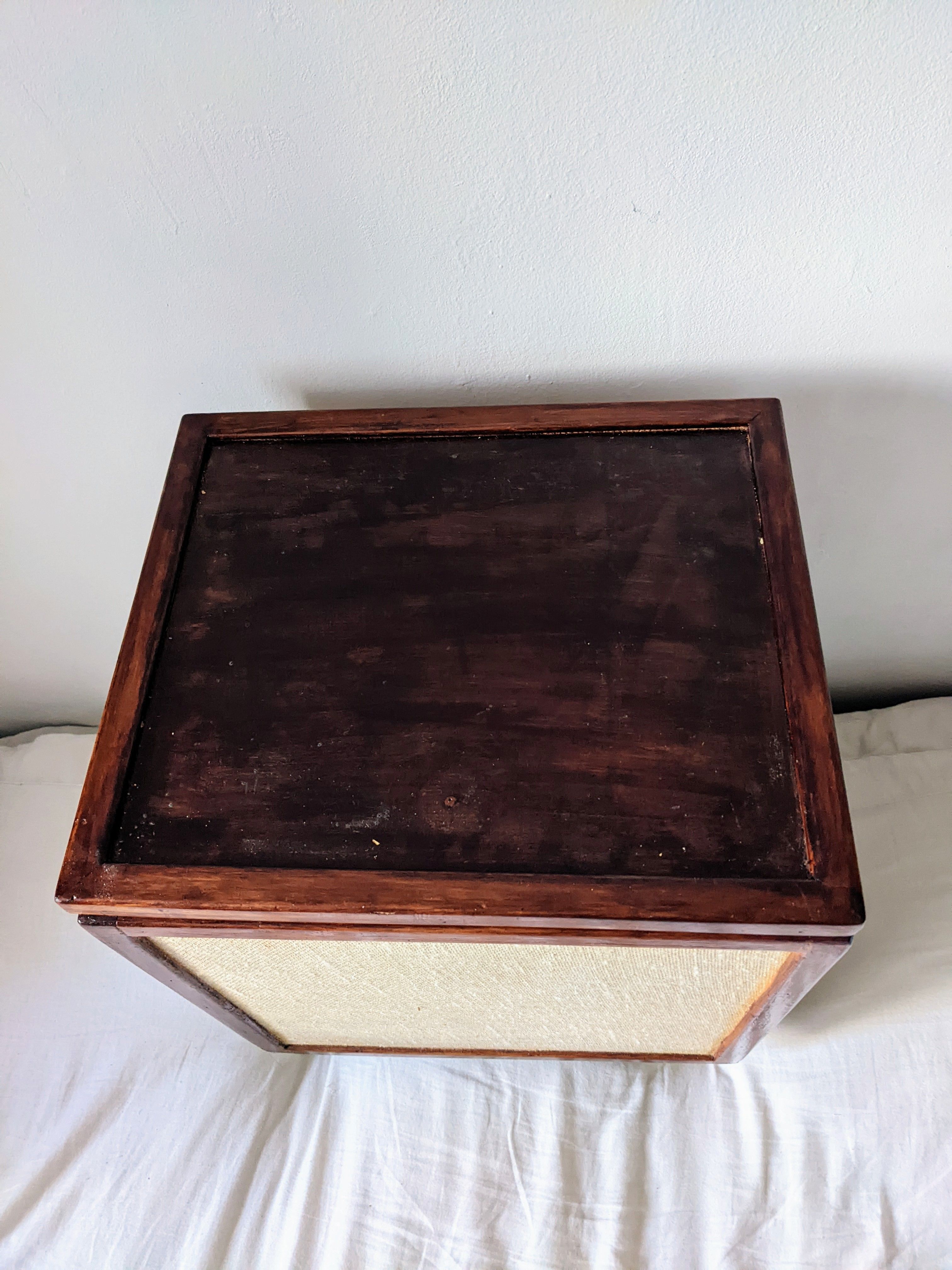 Burlap chest and varnished wood