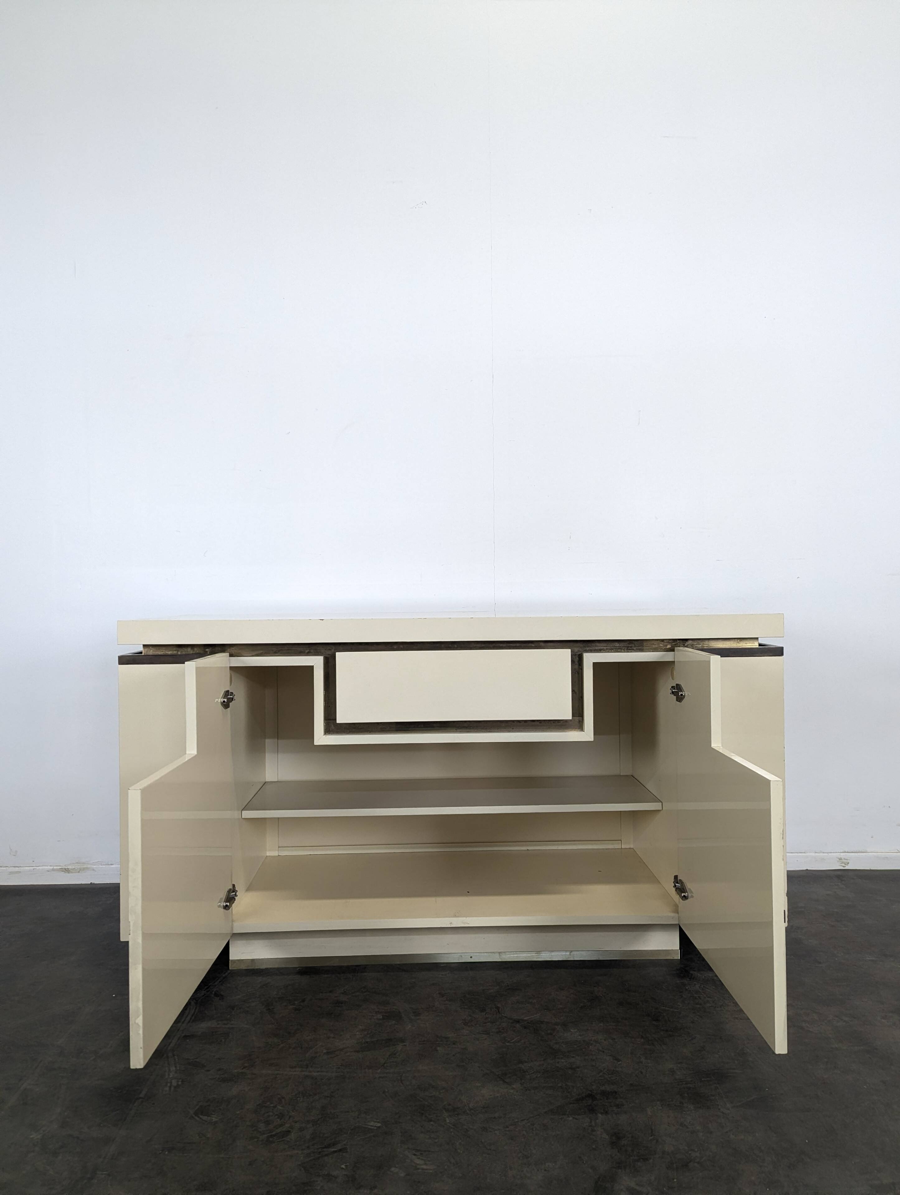 White lacquered enfilade by Jean Claude Mahey published by Rochebobois.