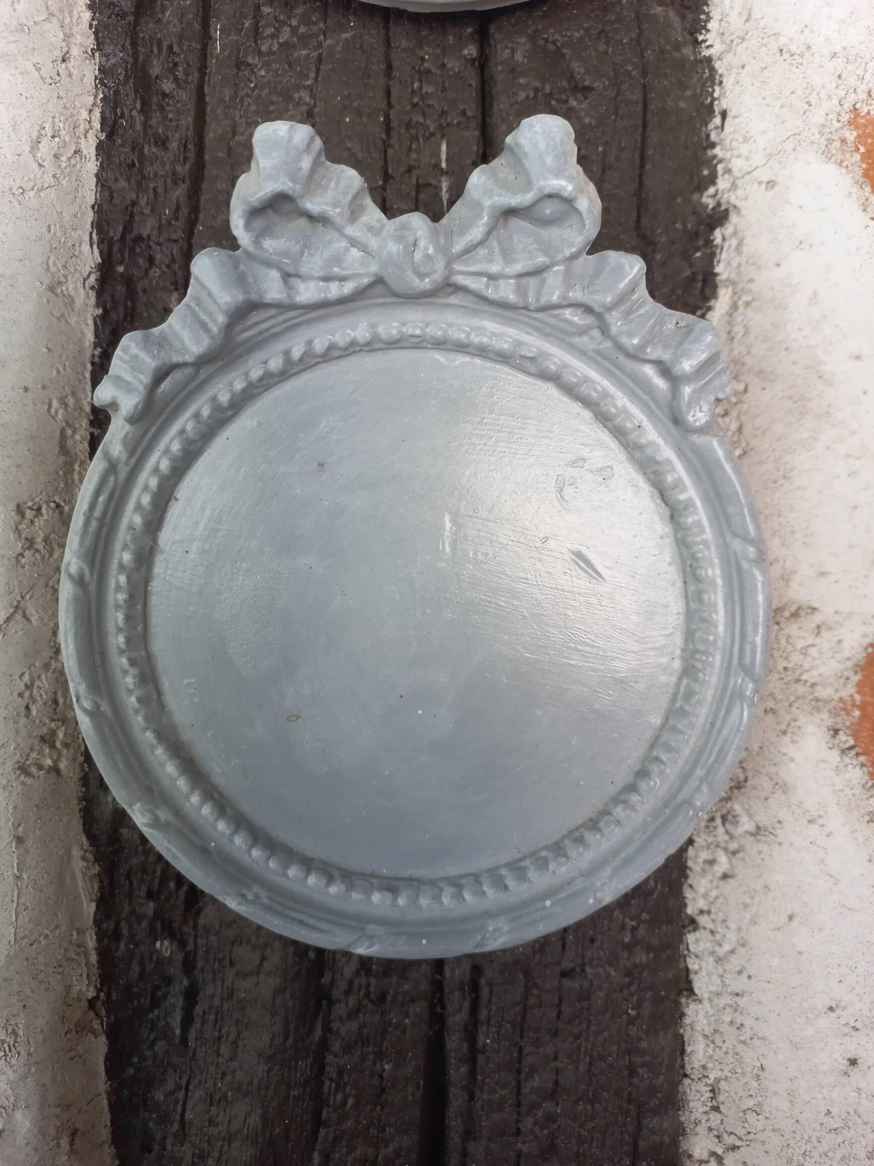 Pair of gray patinated plaster frames