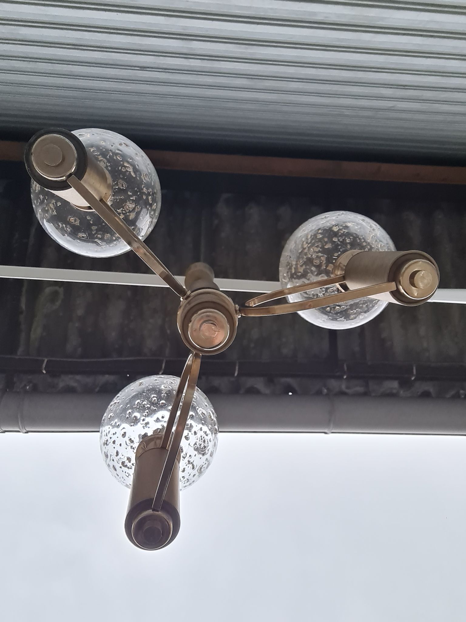 Brass and blown glass chandelier inlaid with gold
