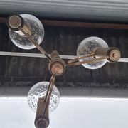 Brass and blown glass chandelier inlaid with gold