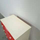 Vintage ladekast met rood roze kunststof lades 1970