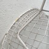 Pair of armchairs in white patinated mesh metal.