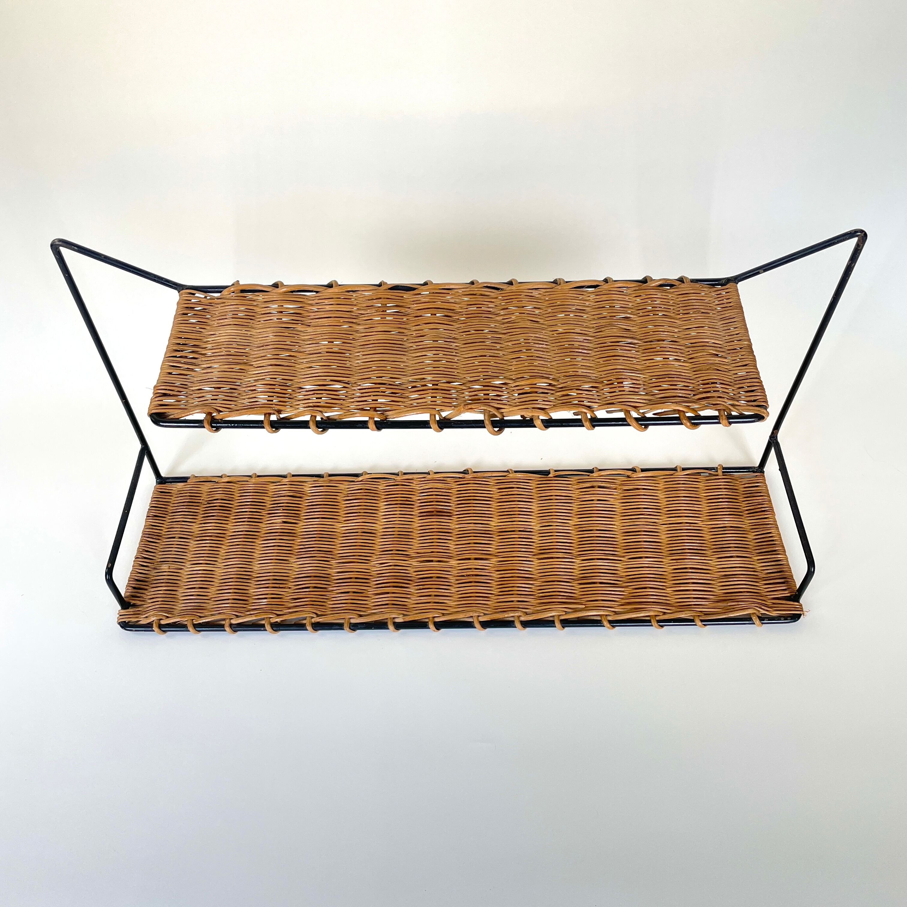Pair of Raoul Guys wall shelves, 1950